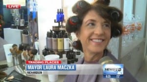 An on air interview with Mayor Laura Maczka of Richardson, shown using Click n Curl in her hair.